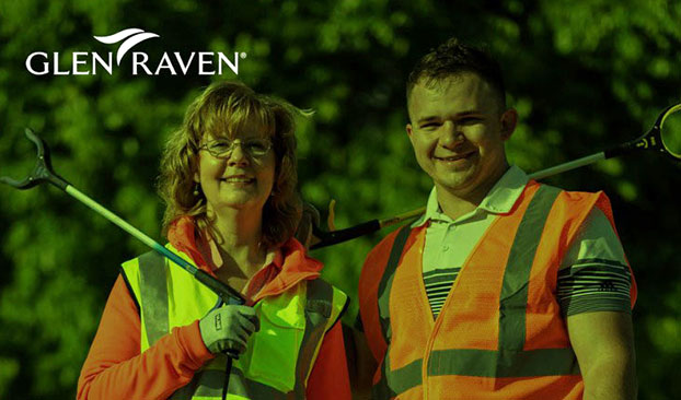 Two Glen Raven associates participating in sustainability efforts and community clean up