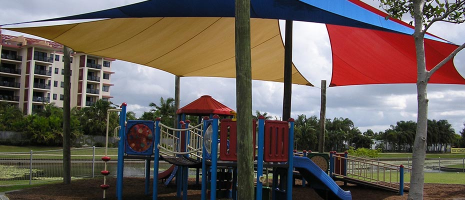 Playground with colorful awning sunshade covering