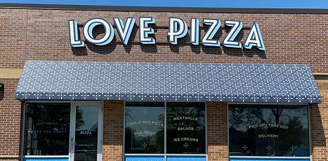 Printcraft custom awning design project for the Love Pizza storefront location
