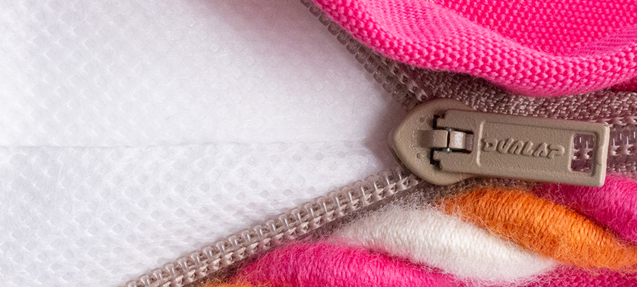 Close-up of a beige Dunlap zipper