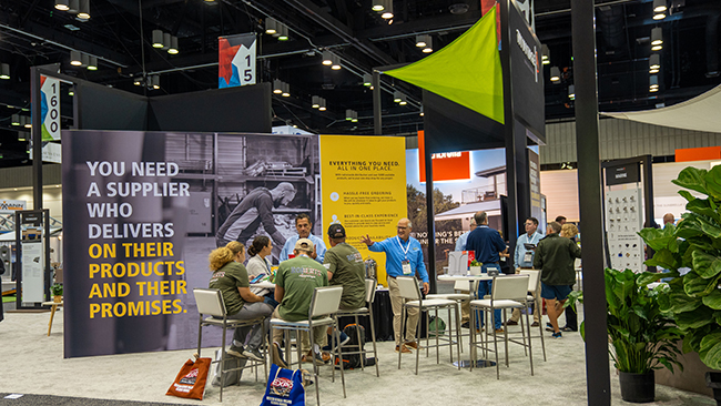 Group of fabrication professionals meeting with Trivantage team at the ATA expo booth 2023