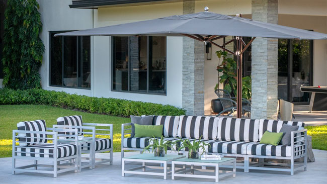 Poolside outdoor upholstery project featuring Sunbrella black and white striped fabric by Kannoa based in Miami, Florida, USA.