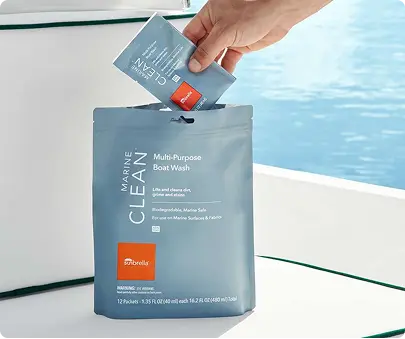 Mulitpurpose boat wash packet in adult hand