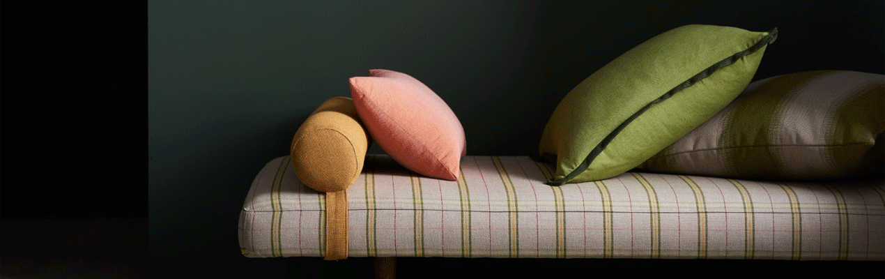 Assorted throw pillows in candy-colored fabric