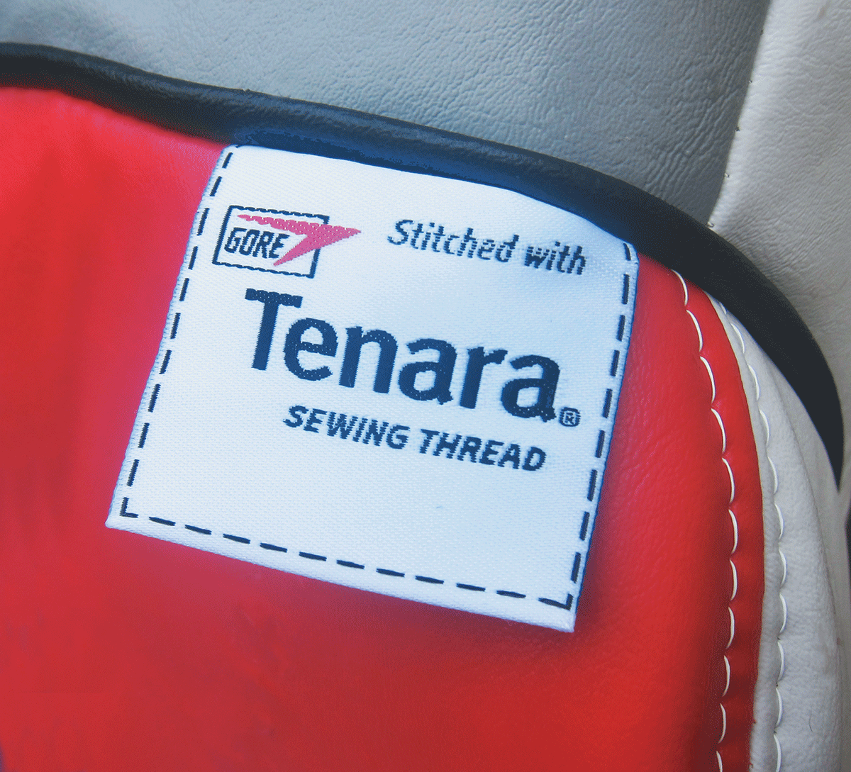 A logo of Tenara sewing thread