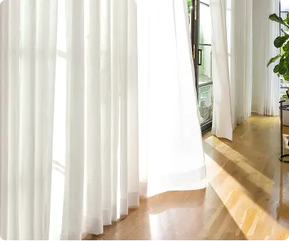 Image of white floor length curtain