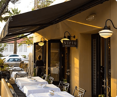 outdoor cafe with shade awnings