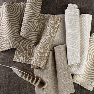 several rows of Sunbella David Rockwell fabric patterns in beige, brown, and white colors