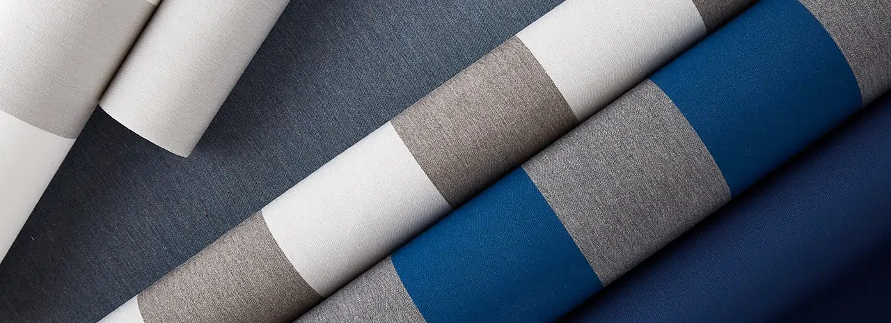 glamour image of various Sunbrella shade fabric rolls
