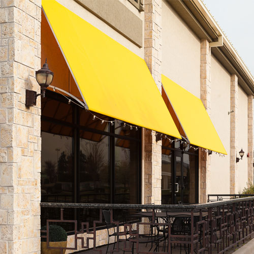 yellow fabric awnings on a building